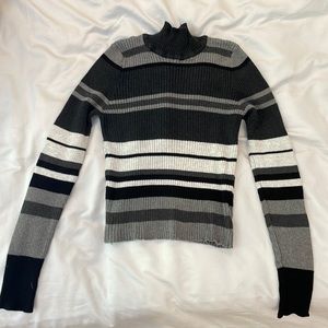 Grey, black and white striped turtleneck cropped.